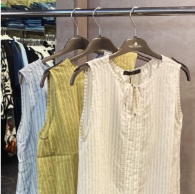 Striped linen tops on hangers