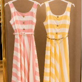 Striped maxi dresses on hangers