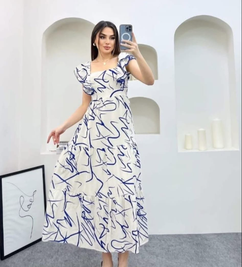Model wearing a scribble-print maxi dress from IN Touch, Jounieh